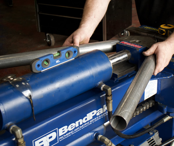 Bending the stainless steel exhaust - bespoke for you at Elite Motorists Centre
